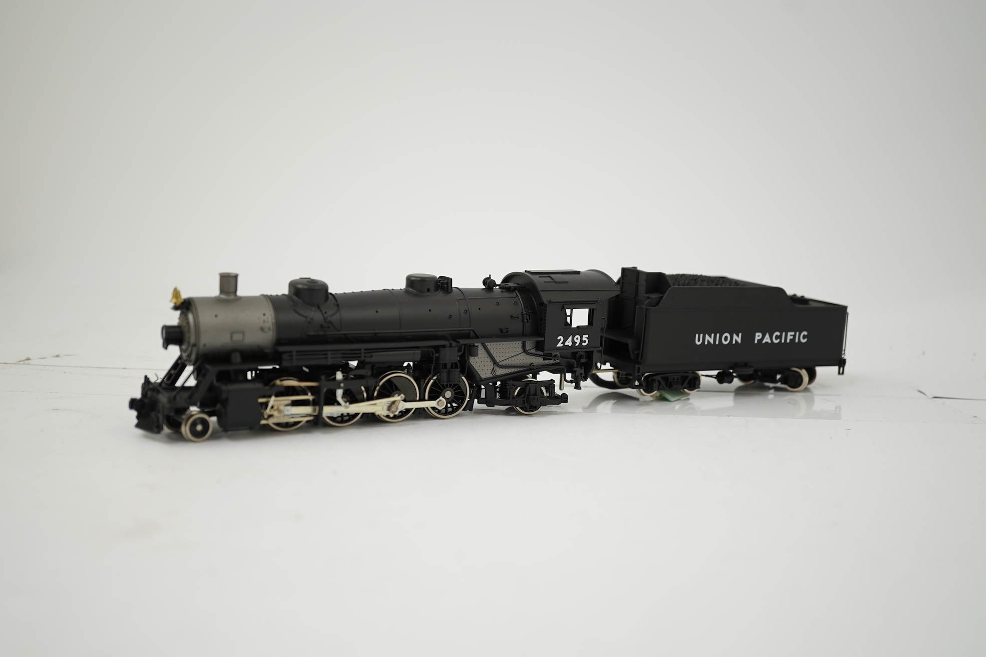 Two boxed HO gauge Union Pacific locomotives; a Genesis (G9008) model of USRA, 2495, 2-8-2 locomotive with bogie tender, together with a Mantua (313-003) 2-6-0 Mogul locomotive with bogie tender, both powered for two rai
